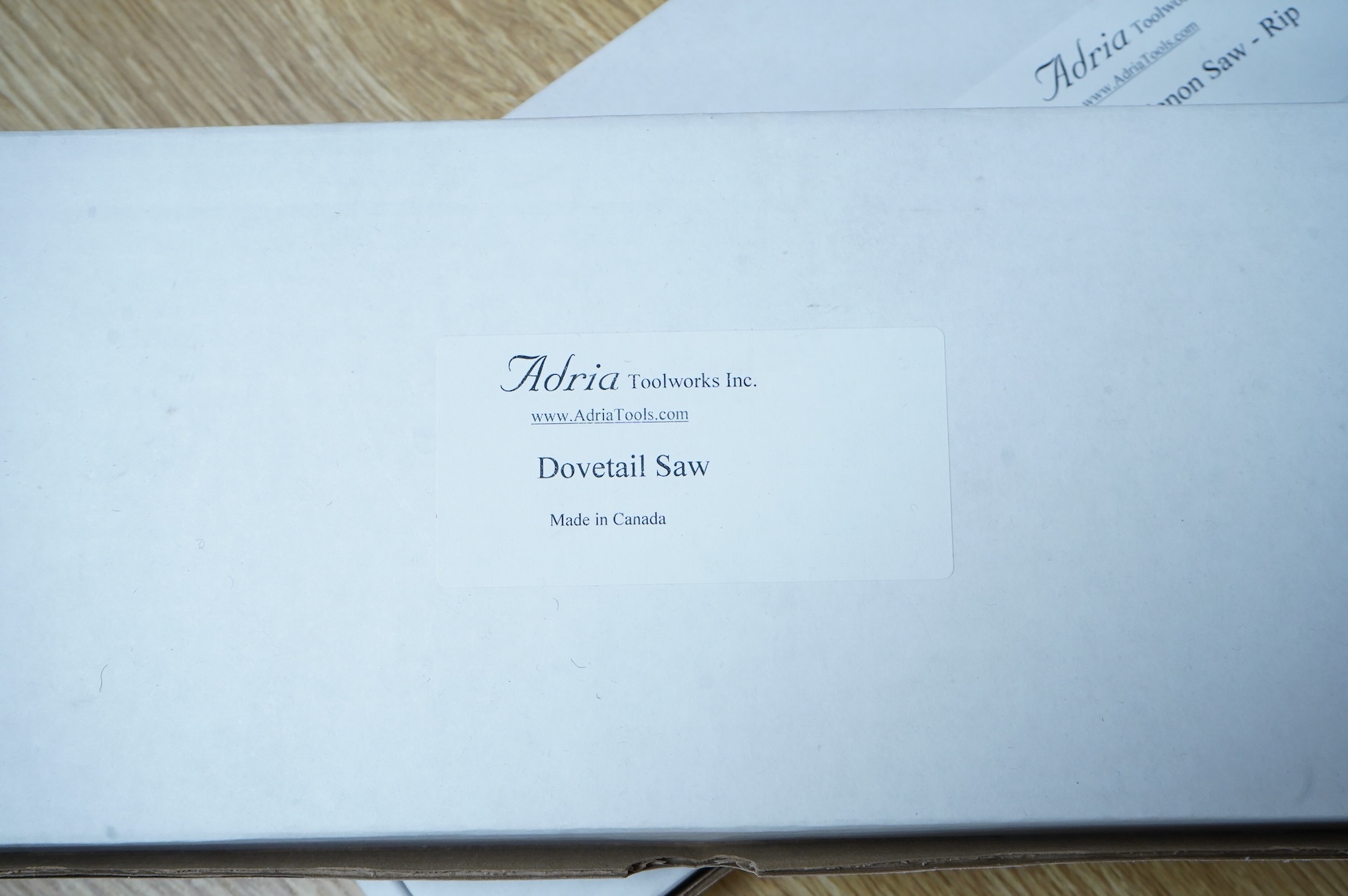 Two boxed Canadian Adria Toolworks Inc. wood saws; a small tenon rip saw, together with a dovetail saw